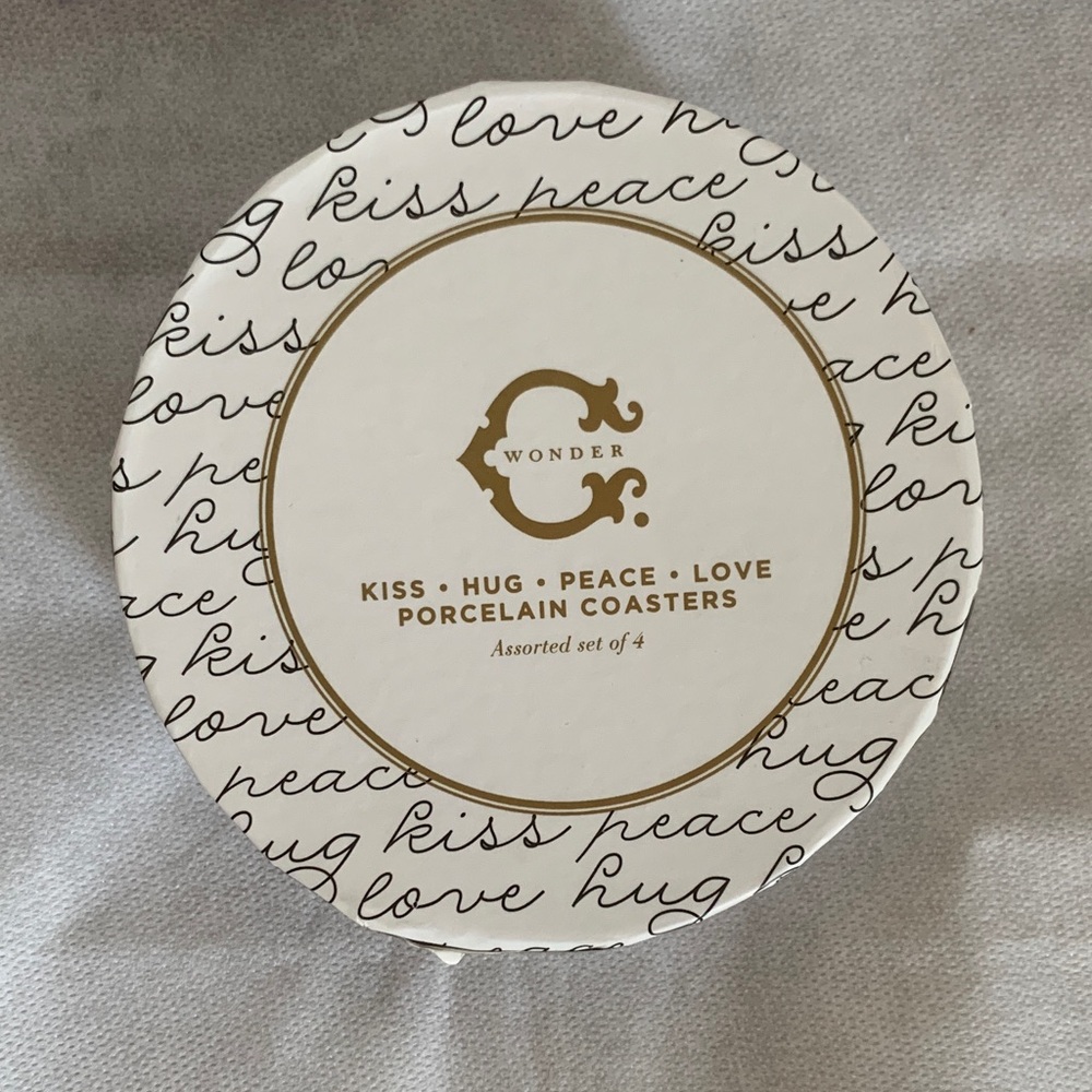 NIB C. Wonder Gold and Black Porcelain Coasters